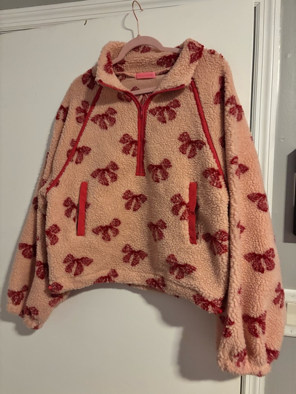 Cozy Sherpa Fleece Pullover with Red Bow Print